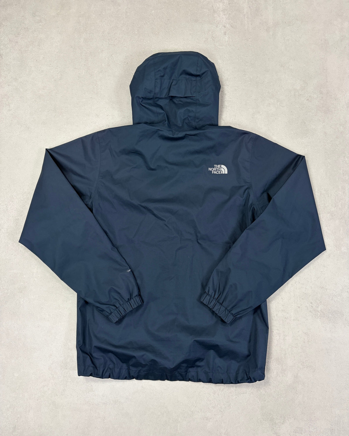 The North Face Regenjacke Stahlblau mit Kapuze – Rückseite