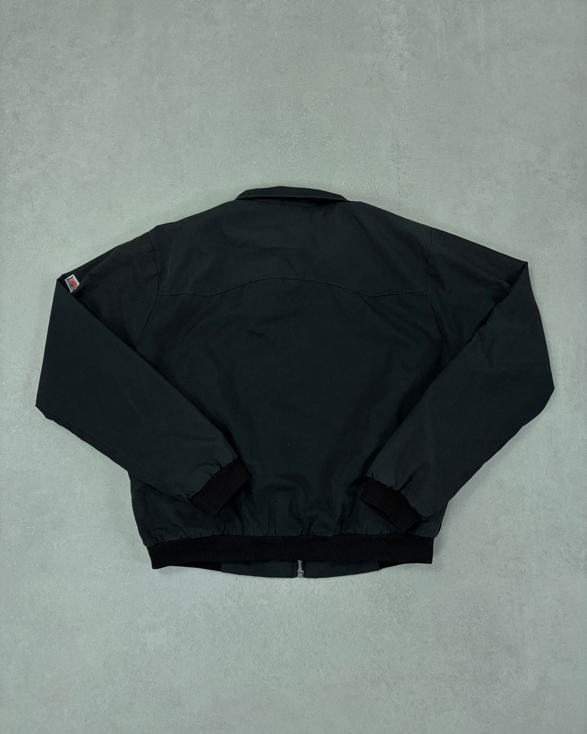 Lonsdale Harrington-Jacke Schwarz mit Tartan-Futter – Rückseite