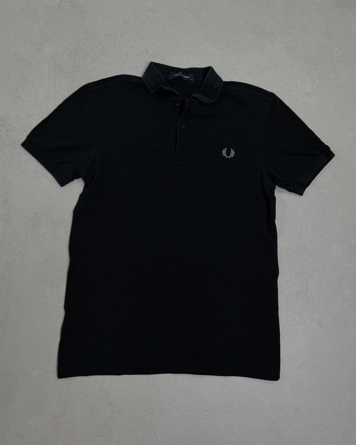 Fred Perry Poloshirt Schwarz Größe S – Vorderseite